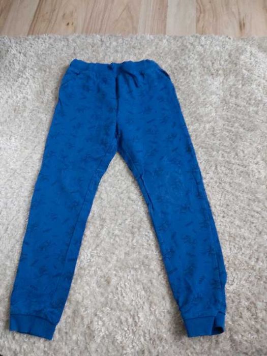 Niebieskie dresy dinozaury spodnie dresowe joggery 140 cm chłopięce