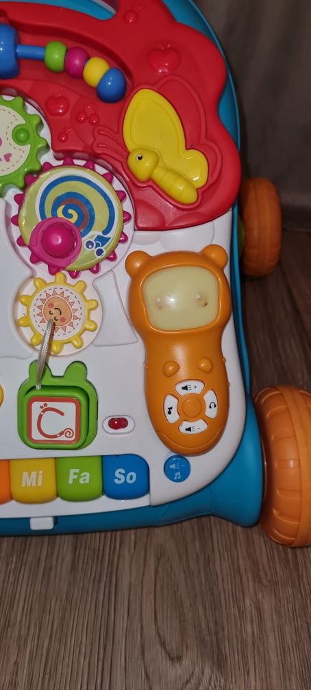 Pchacz chodzik stolik edukacyjny 2w1