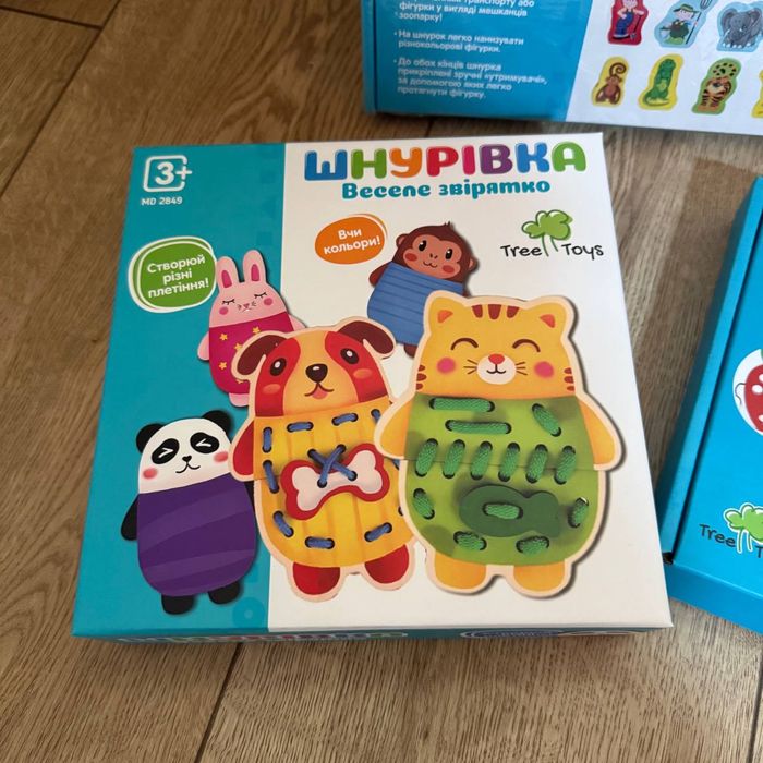 Дитічі іграшки-шнурівки