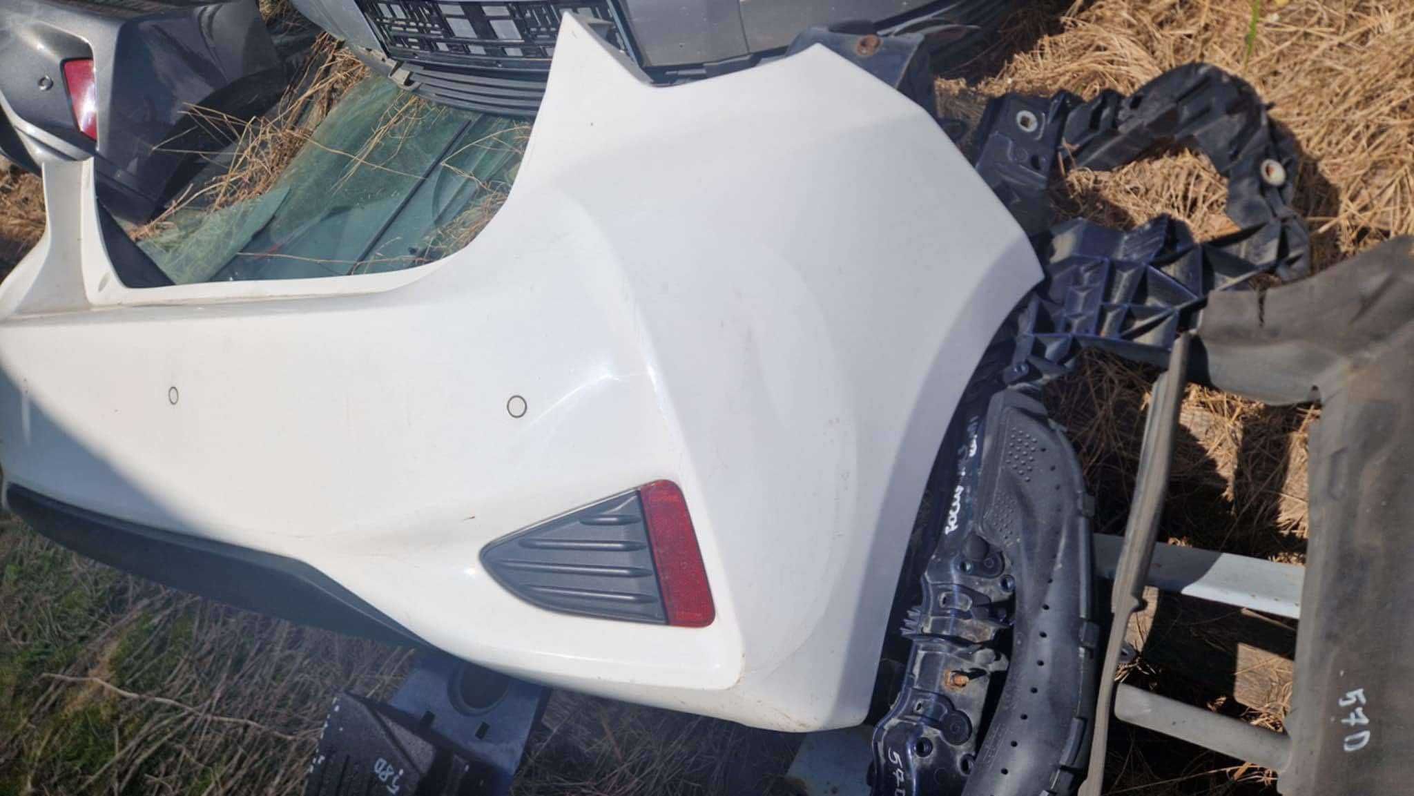 Zderzak tył toyota yaris III hybryda kolor 040