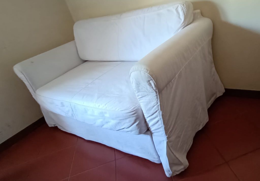 Sofá cama com arrumação