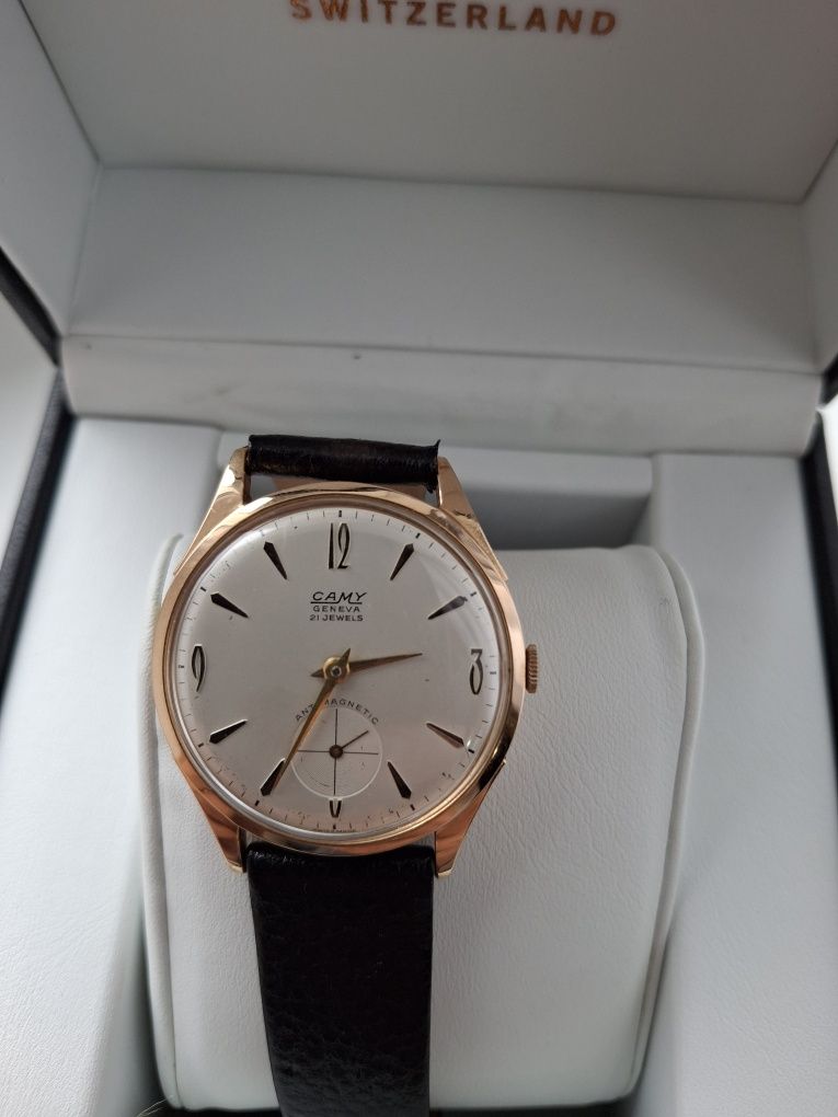 Золотий годинник Camy geneve.