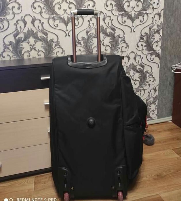 Сумка дорожная вместительная.