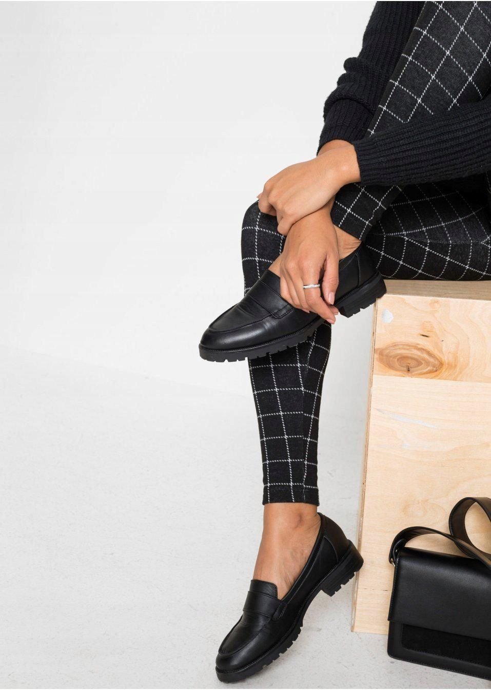 B.P.C legginsy czarne w białą kratę 32/34.