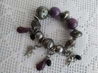 Pulseira prateada com anjos!