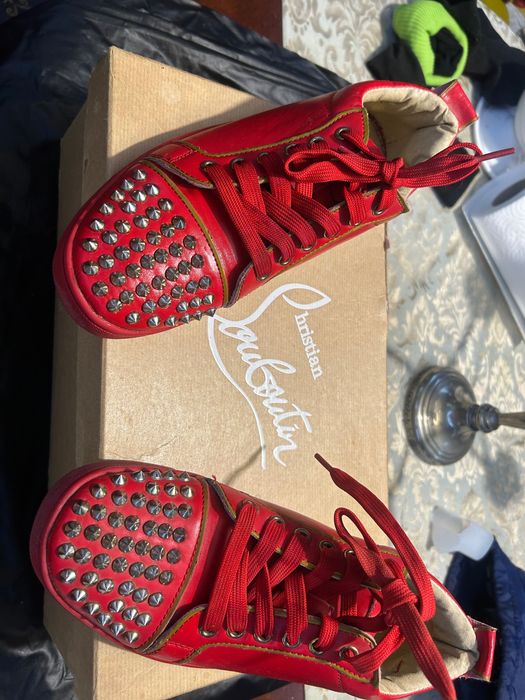 Ténis Louboutin vermelhos