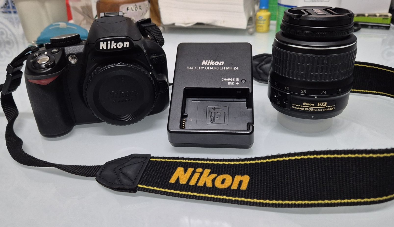 Nikon D3100 + lente