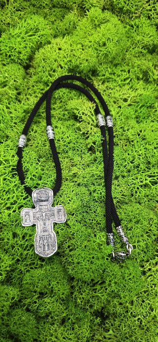 Срібний хрест на шовковому шнурку