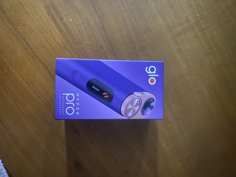 Máquina Glo em caixa com carregador como nova