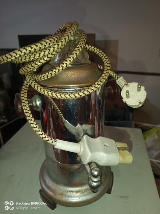 Máquina de café mas bem antiga