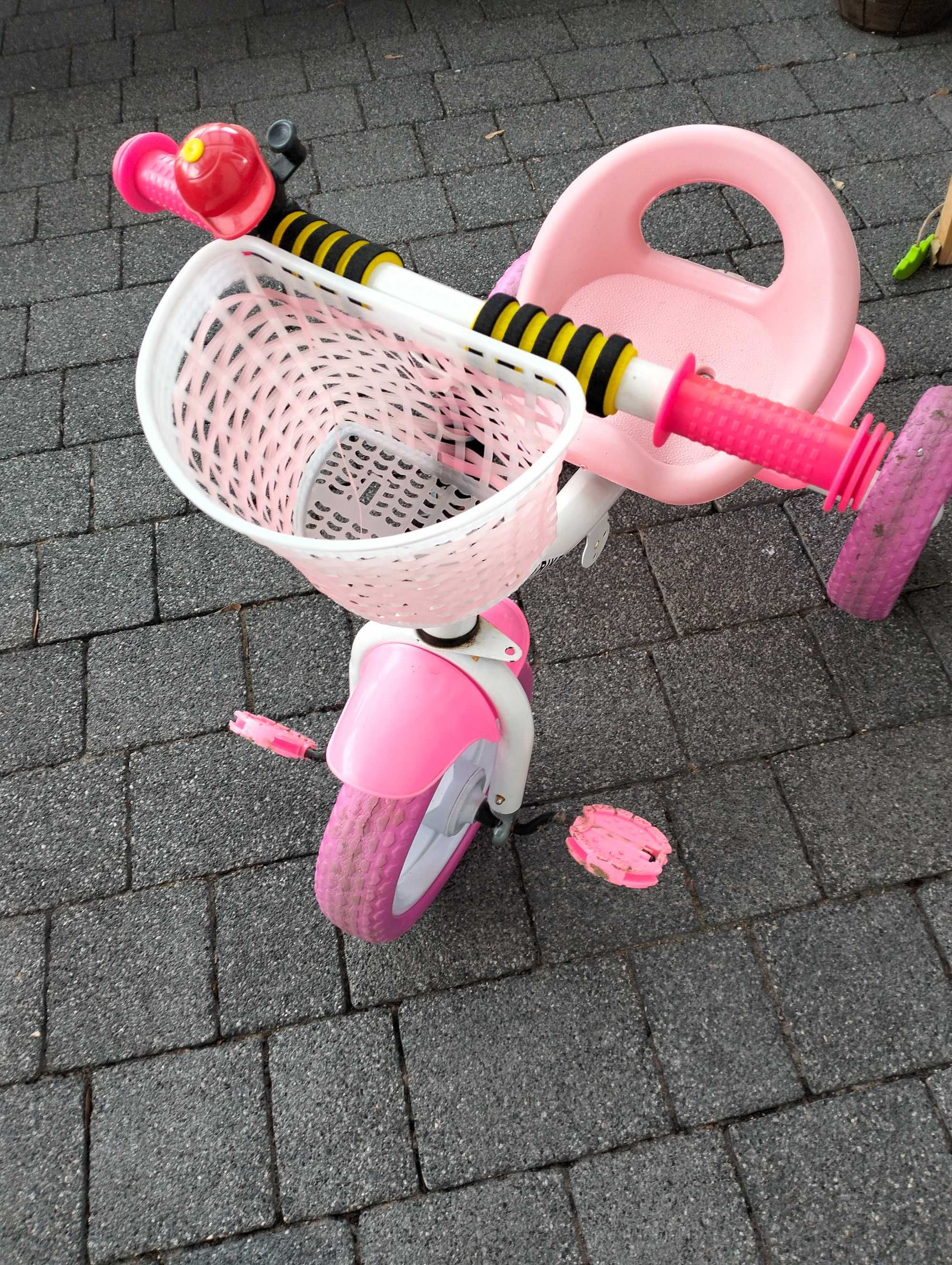 Różowy rowerek pchacz trójkołowy do nauki