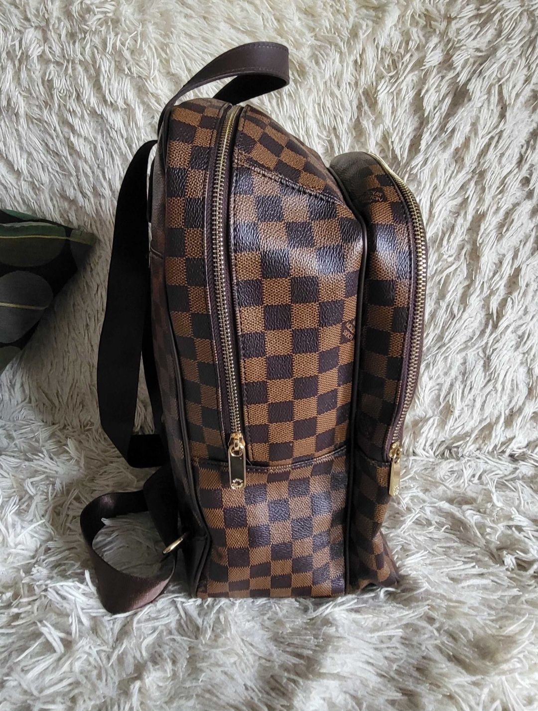 Mochila unisexo castanha