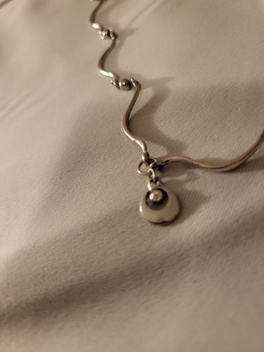 Fio prateado em excelente estado