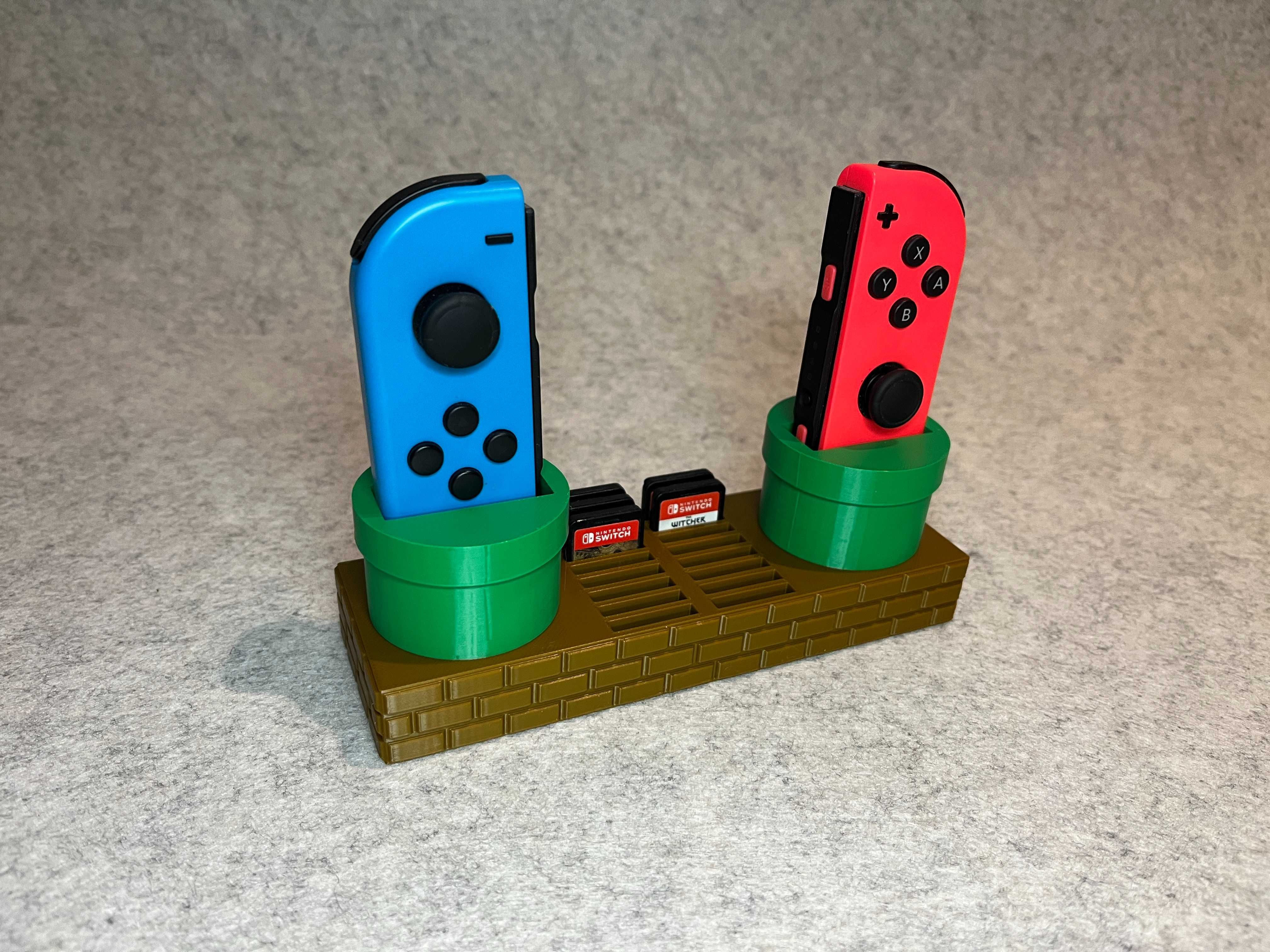Stojak podstawka Super Mario na Joy-Con oraz 16 gier Nintendo Switch