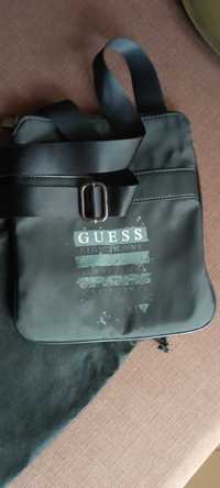 Saszetka GUESS 23,5 x 19,5 cm czarna kod: hmnnas p1805 męska torebka