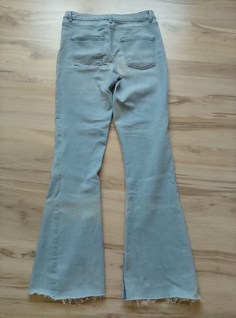 Jasne spodnie dzwony 40/L