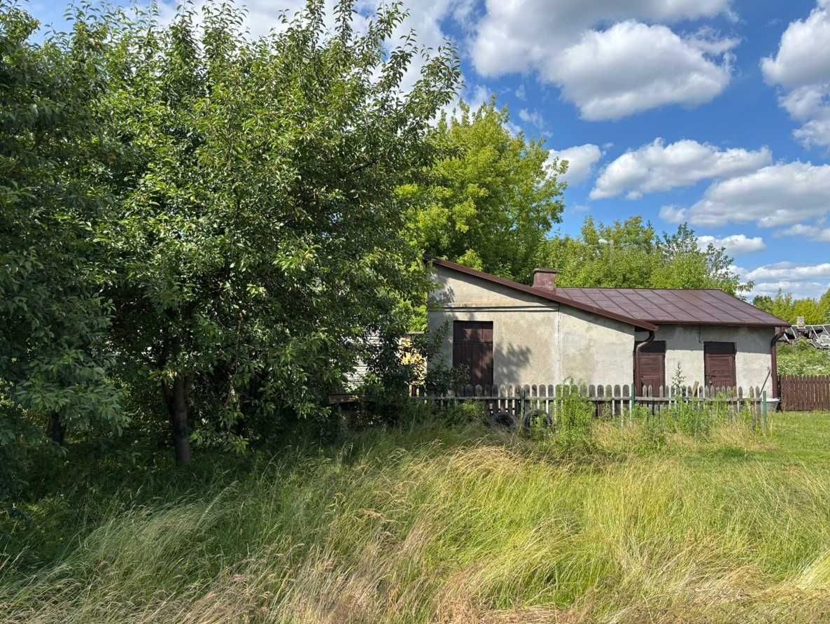 Dom z działką usługową 692 m2 przy ul. Stacyjnej