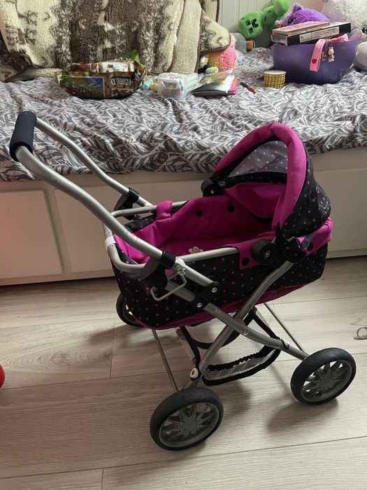 Дитяча іграшкова коляска