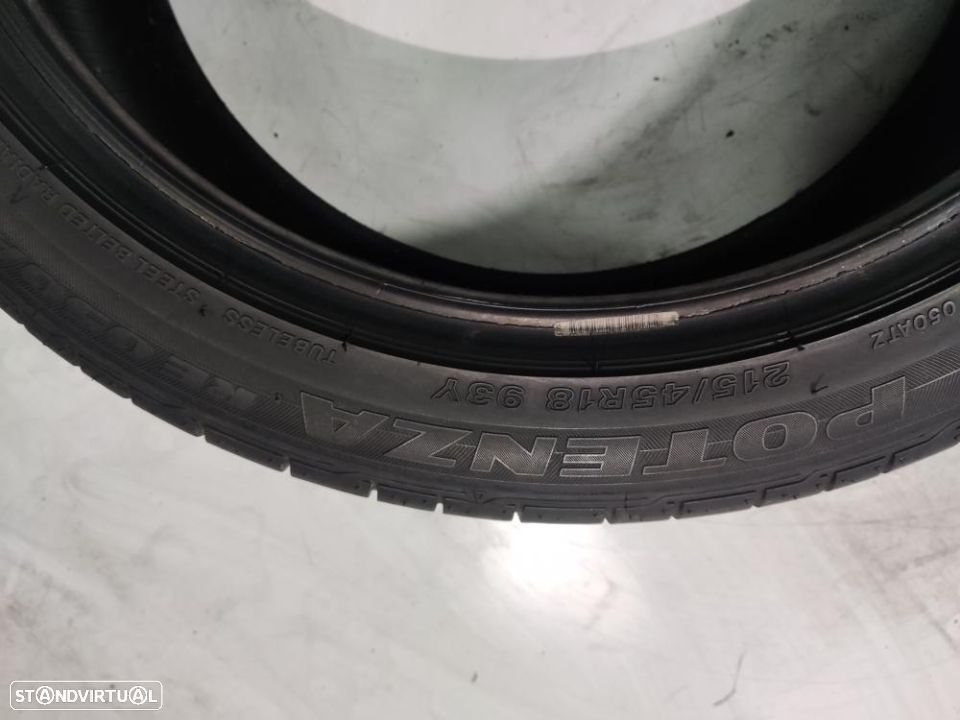 2 pneus semi novos 215-45r18 bridgestone - oferta dos portes