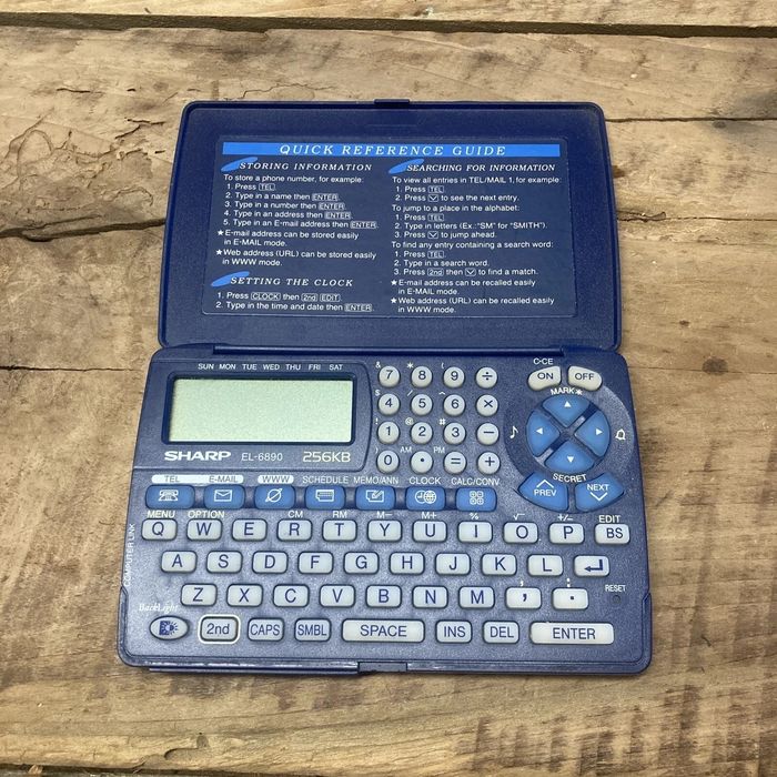 Электронный калькулятор-нотатник Sharp EL-6810