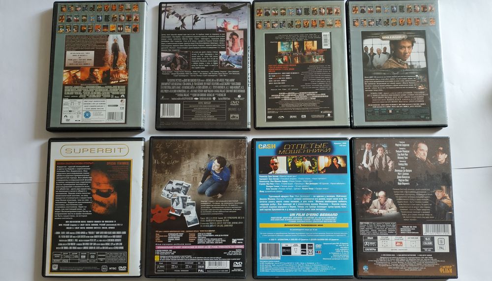 DVD диски с фильмами: Война миров. Беглец. Код Да Винчи  и др.