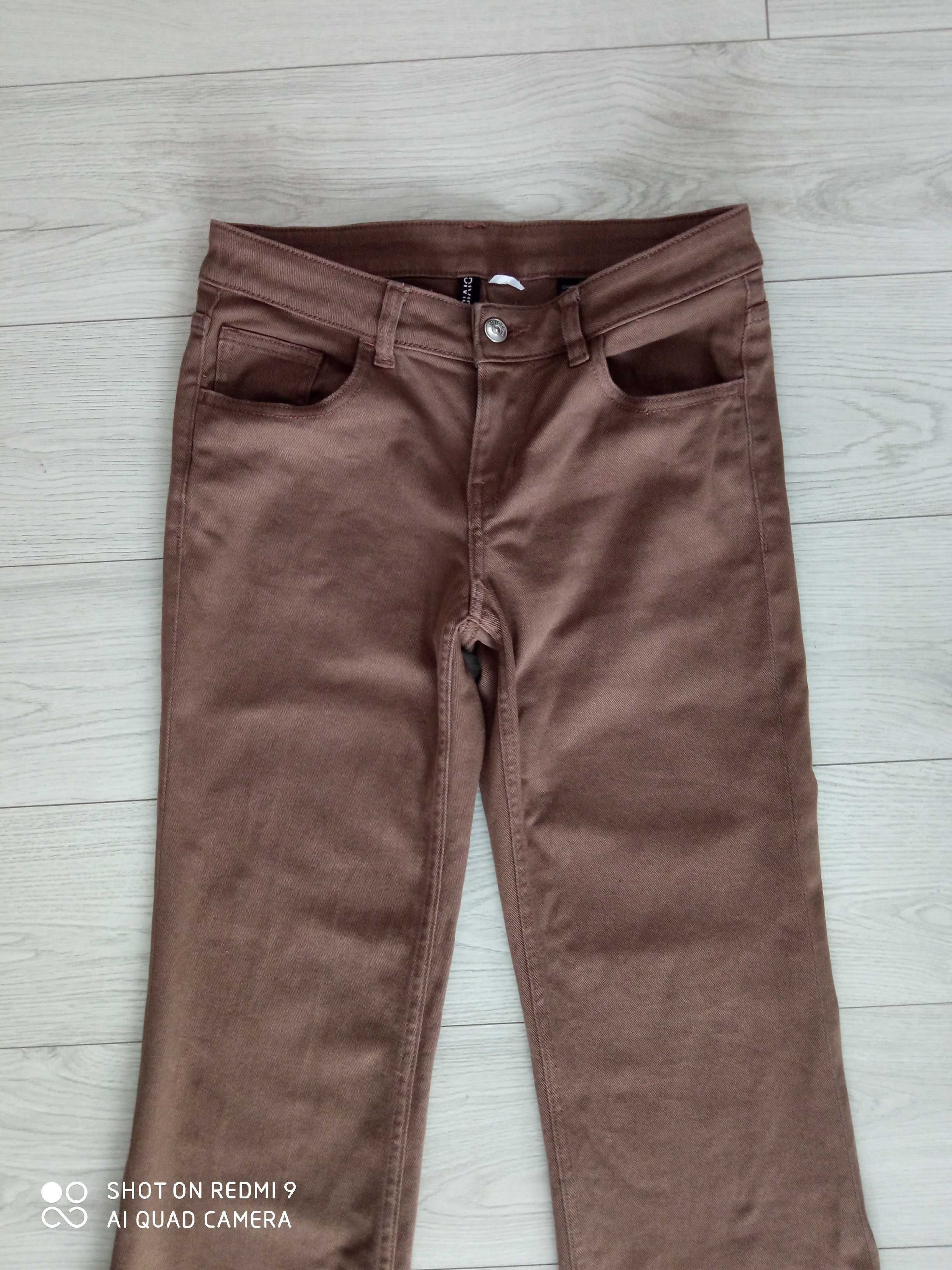 36/S, H&M, rozszerzane spodnie, wydłużają sylwetkę, brązowe