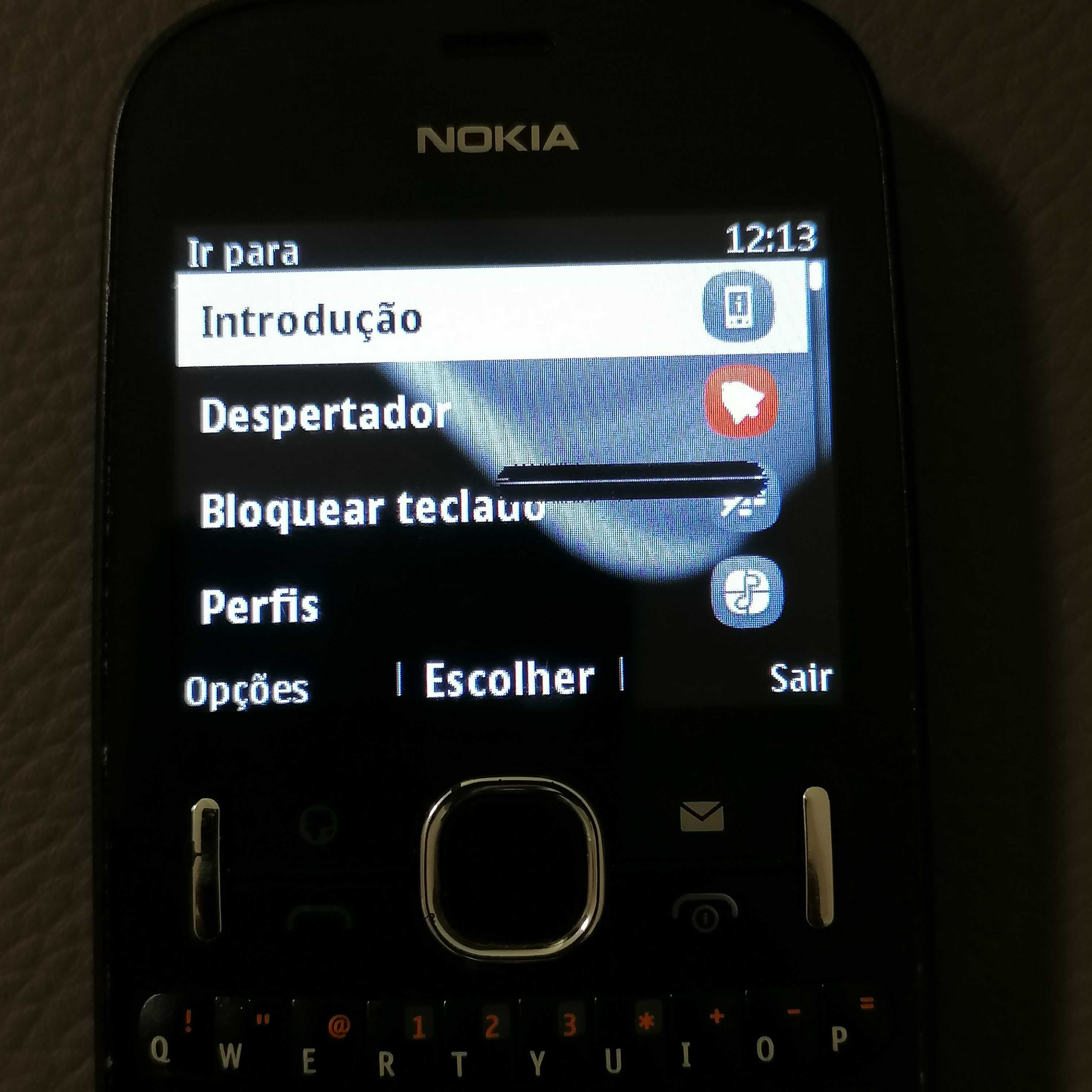 Telemóvel Nokia Asha 201 com carregador