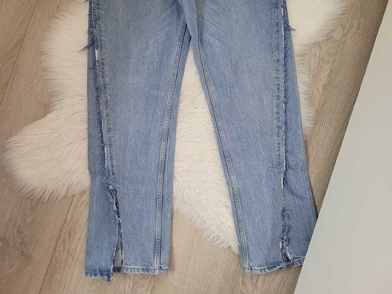 Niebieskie spodnie dżinsy z rozcięciami, Topshop, W25 L 34 (S, 36)