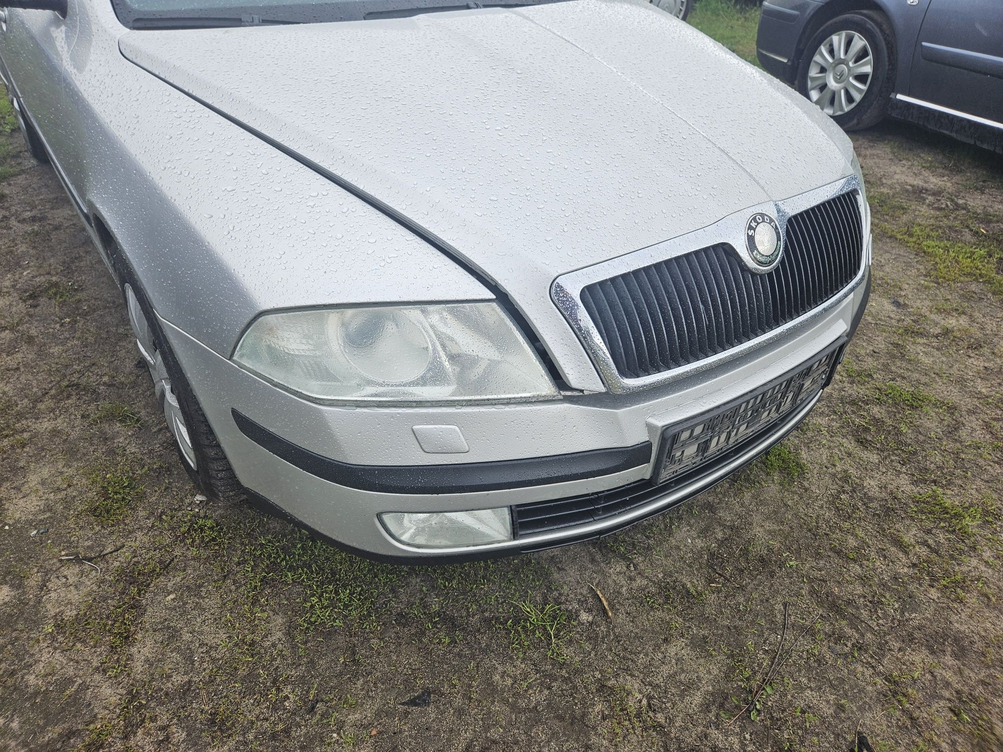 Skoda Octavia 2  maska lampa blotnik drzwi klapa koła 9102