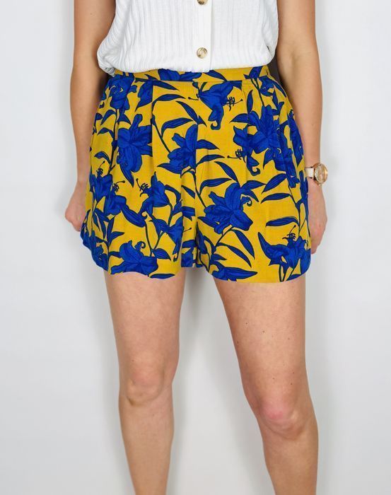 Musztardowe szorty w niebieskie kwiaty z wysokim stanem XS 34 H&M