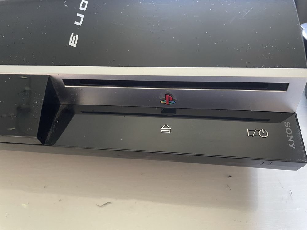 Playstation 3 CECHM03 + 4 pady + gry