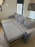 Sofa cama cinzento claro