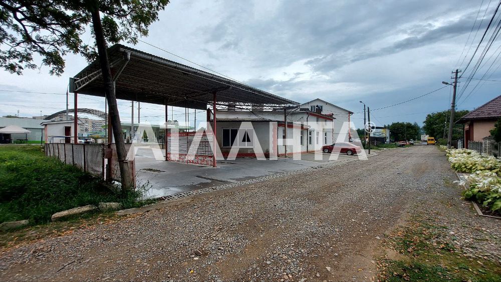 Земельна ділянка 26 соток з СТО, мийкою та готелем