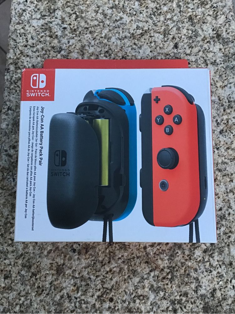 Joy-Con Nintendo Switch - Carregador com pilhas AA