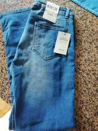 Calças denim homem