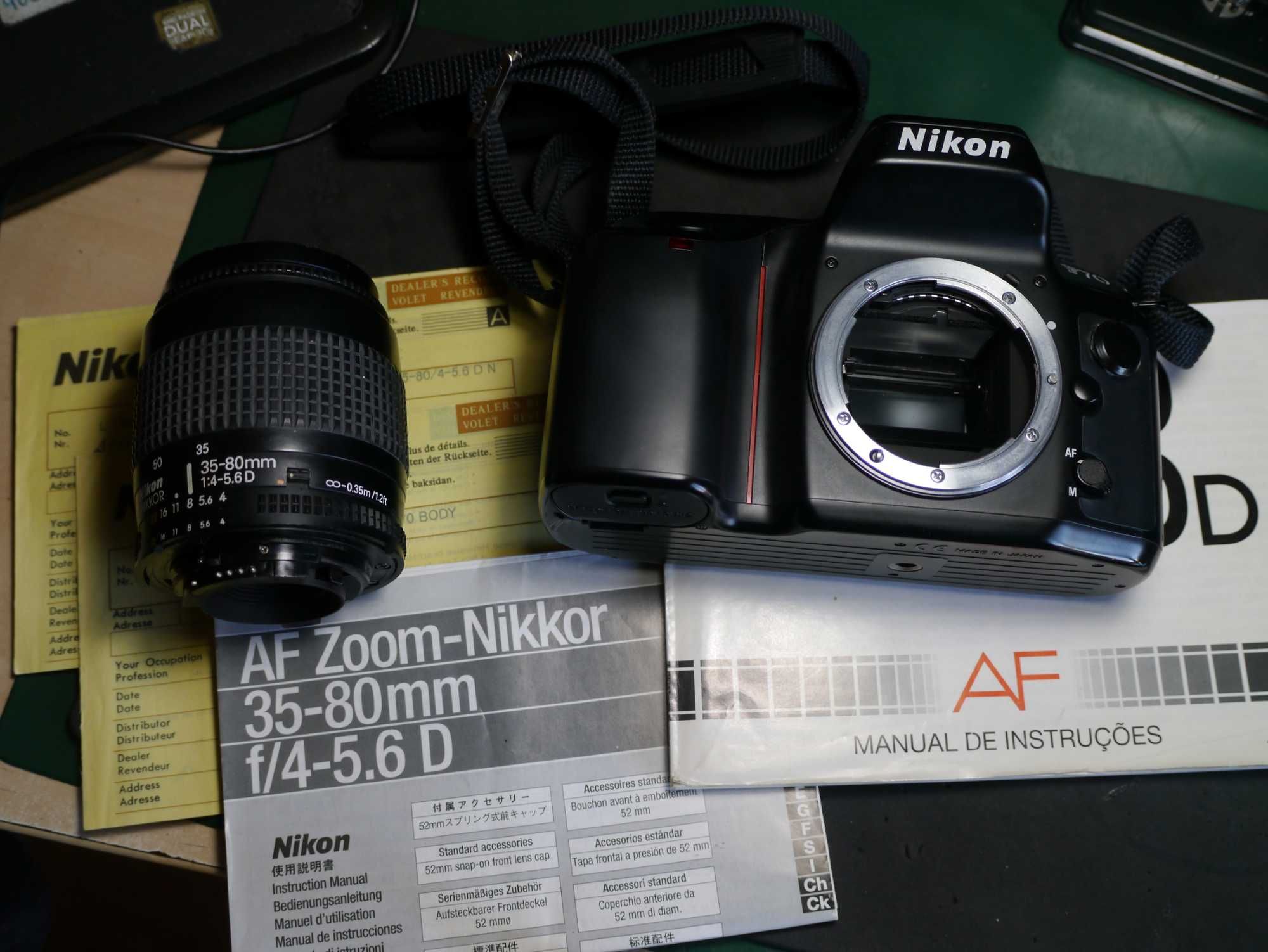 Conjunto Nikon AF camera e lente com manuais