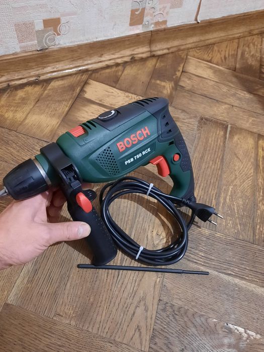 Стан нової!!Дрель ударна Bosch PSB 750 RCE,750вт