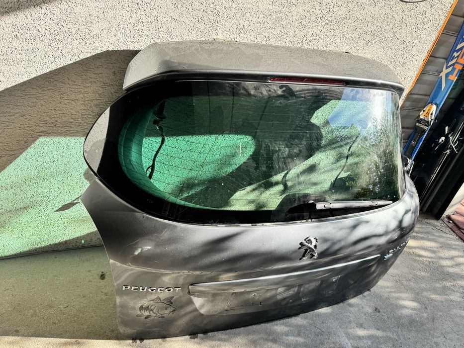 Klapa bagażnika ,szyba peugeot 308