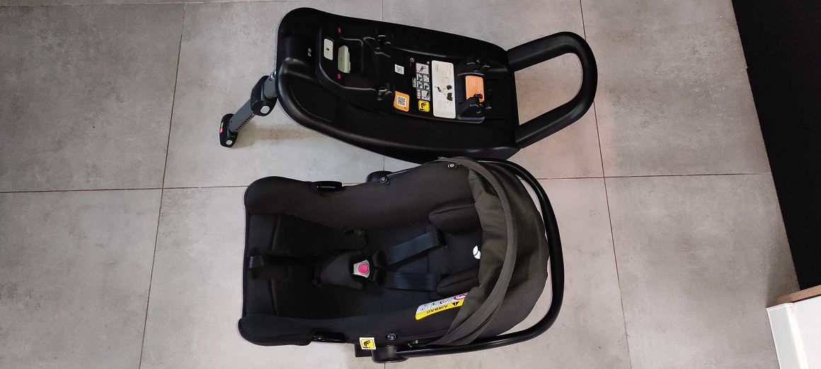 Fotelik dziecięcy/ nosidełko z adapterami do wózka bazą isofix.