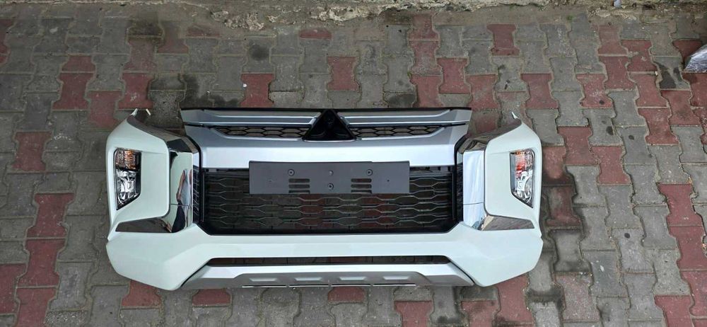 Mitsubishi L200 бампер взборі накладка хром противотуманка разборка