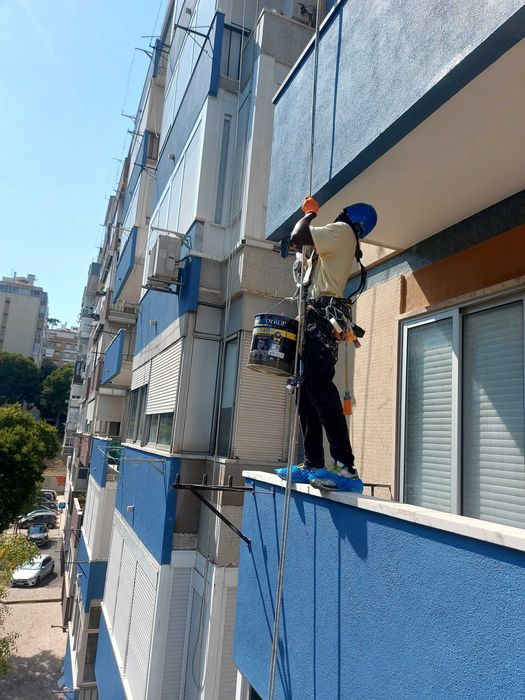 Pintura de prédios em Rapel/telhados