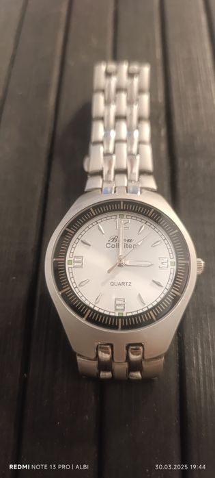 Продам кварцевые часы в идеальном состоянии