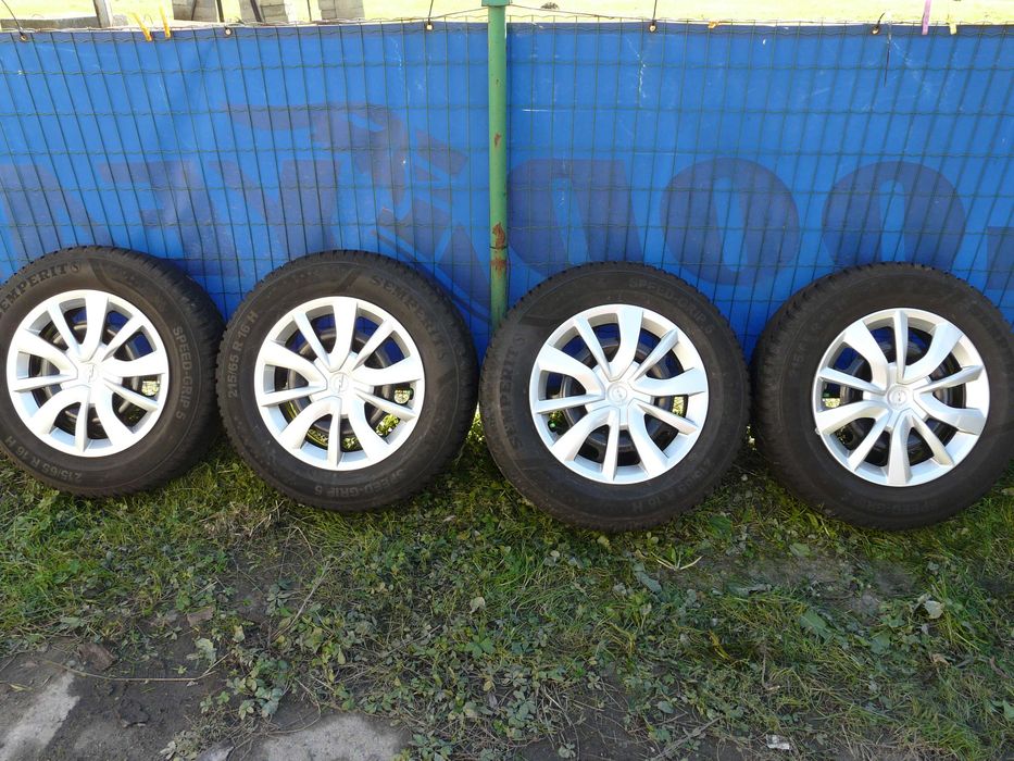 Koła zimowe Opel Mokka 4x106 16 cali 215/65R16 Semperit Kołpaki