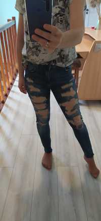 Spodnie damskie jeans dziury Bershka r 38 S/M rozdarcia