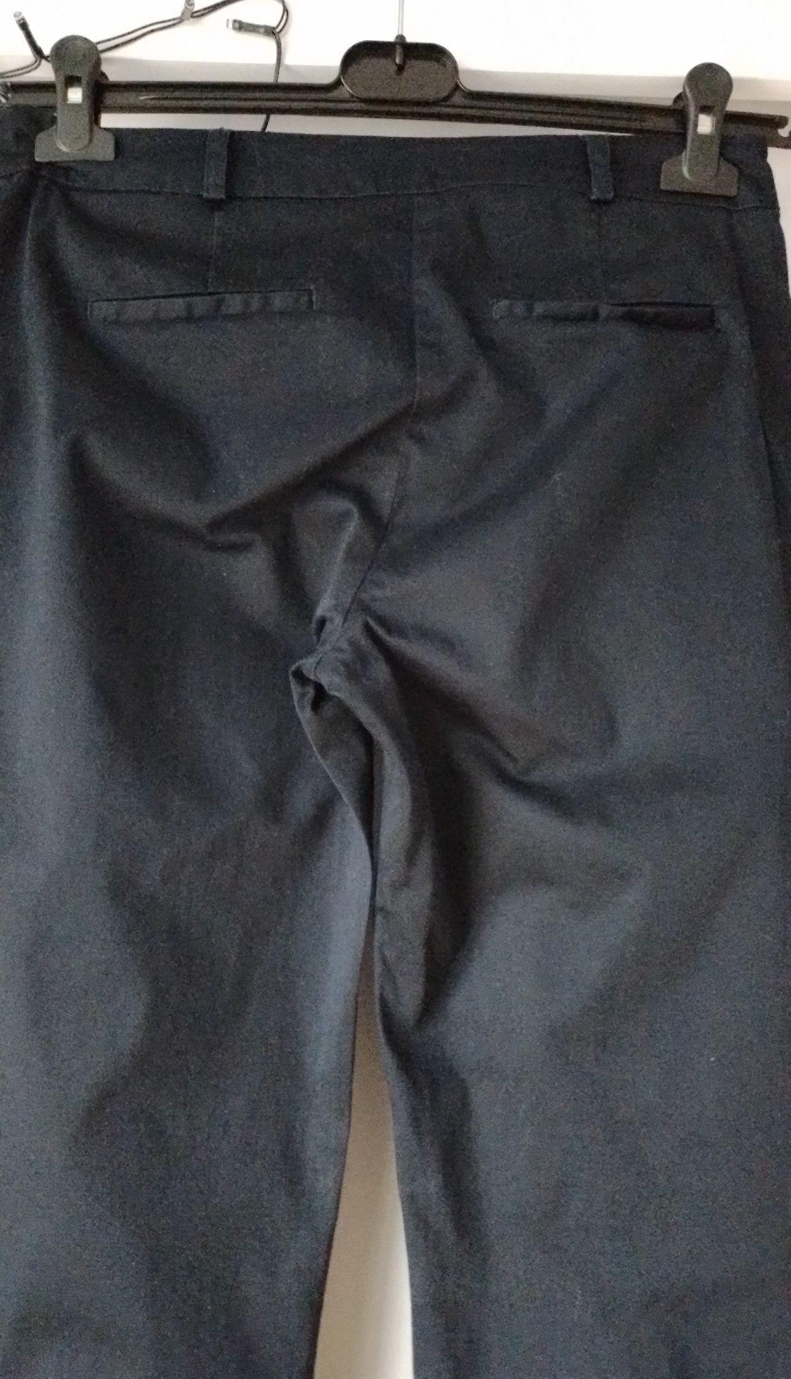 Granatowe materiałowe spodnie damskie cygaretki Orsay rozm.M/L