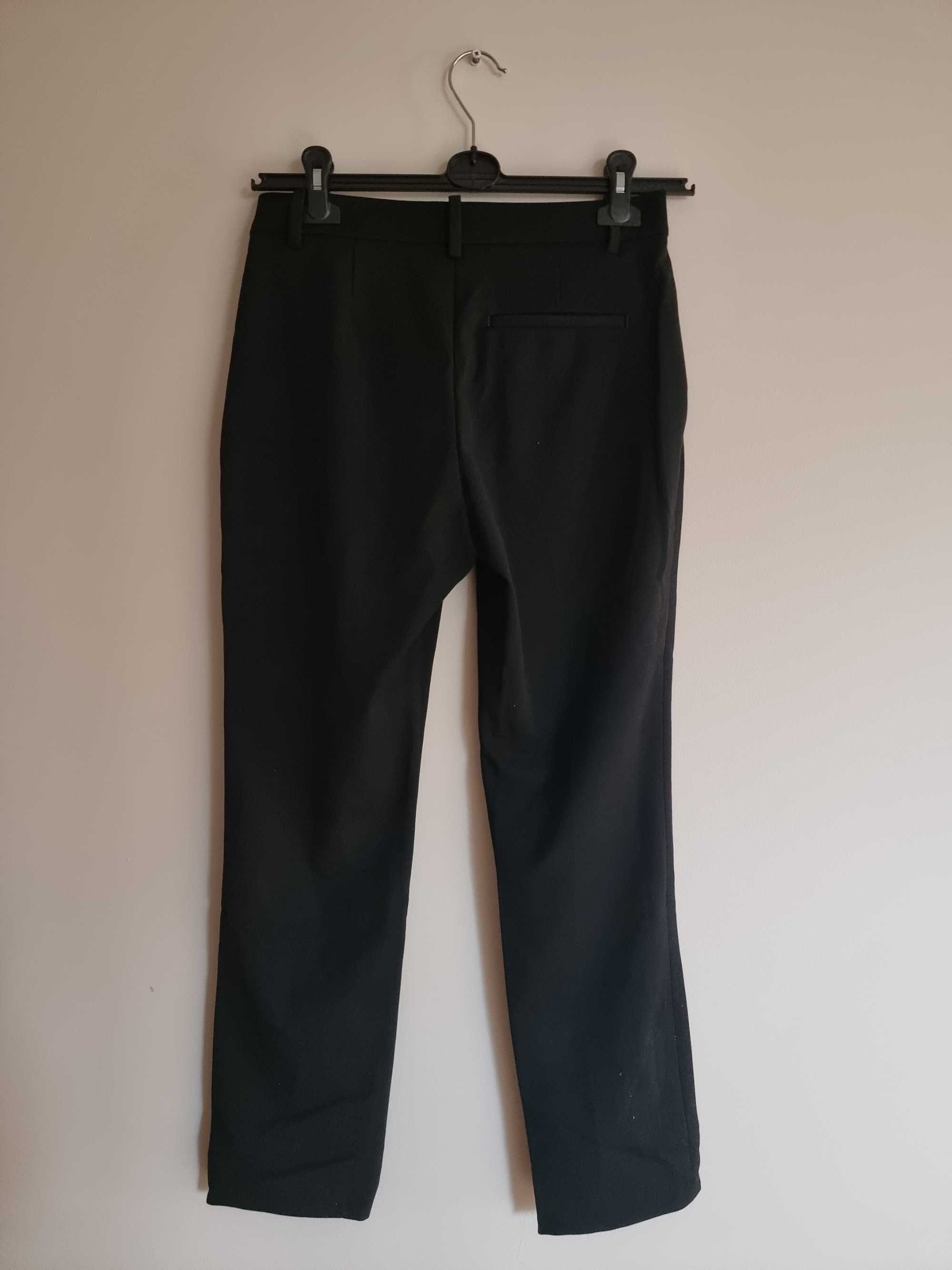 Czarne eleganckie spodnie, chinosy H&M
