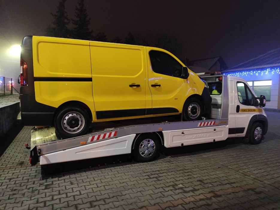 Pomoc Drogowa Autolaweta  Laweta Holowanie przewóz pojazdów