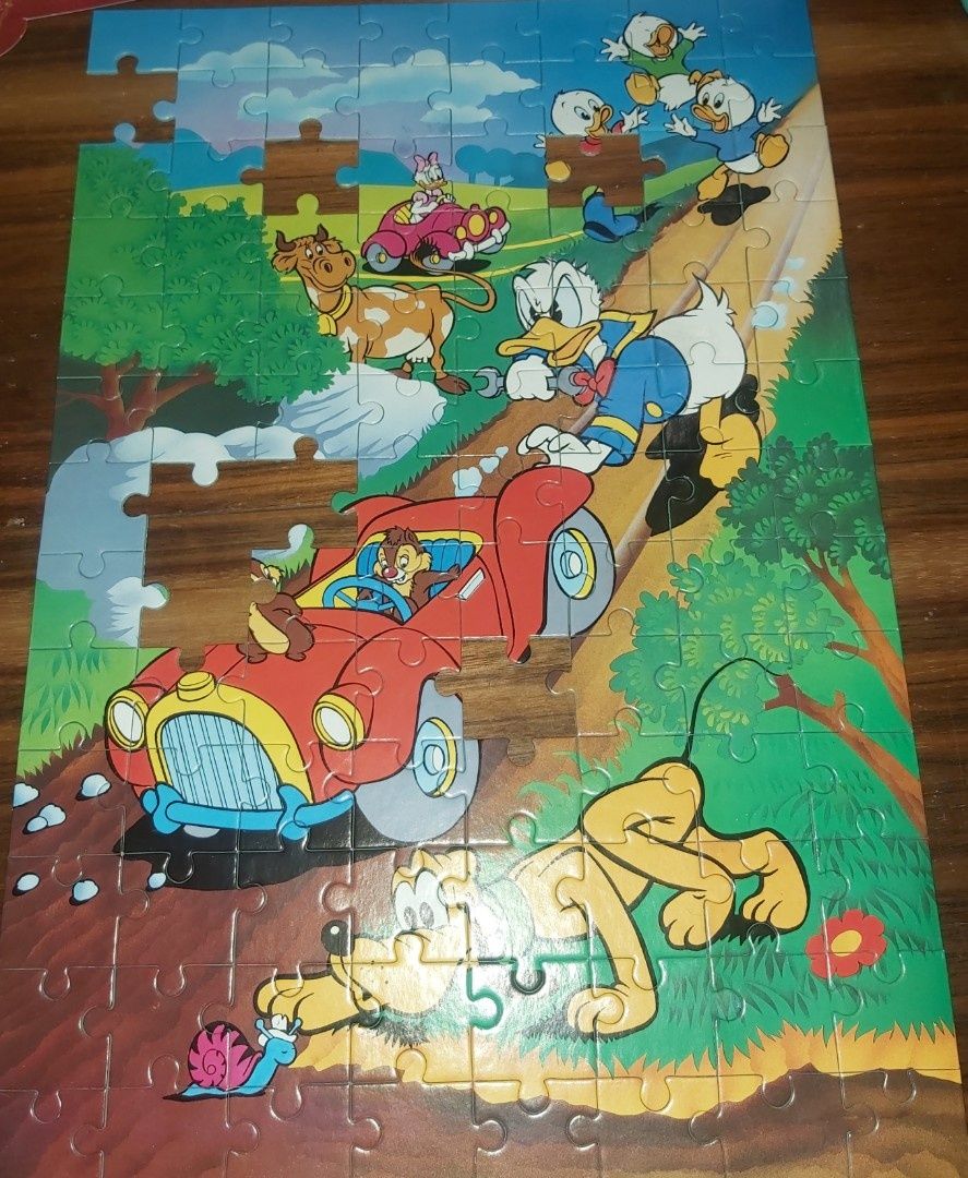 Puzzle trefl 100 - kaczor Donald, Pluto / lata 90