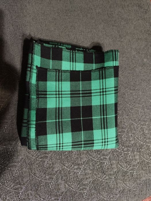 Отрезок ткани зелёного цвета