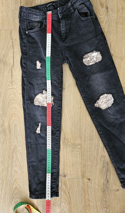 Spodnie jeansy Reserved rozmiar 140 cm.